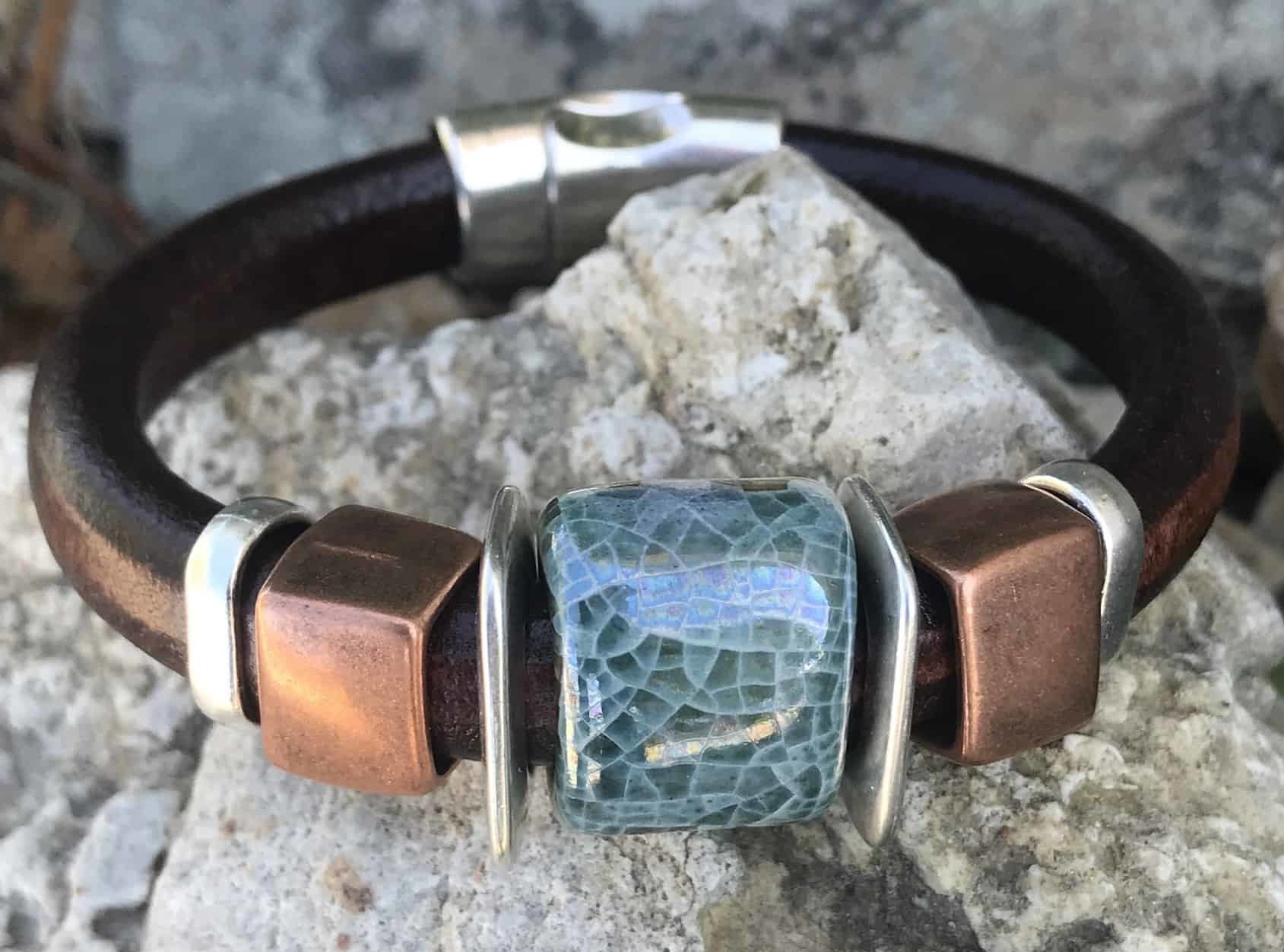 Brown leather bracelet with teal ceramic bead copper and silver accents magnetic clasp